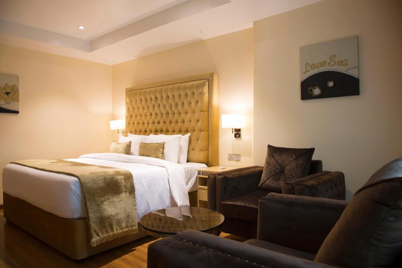 Bon Hotel Elvis Mobushipe Екстериор снимка